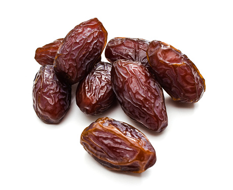 Date fruit on a white background.