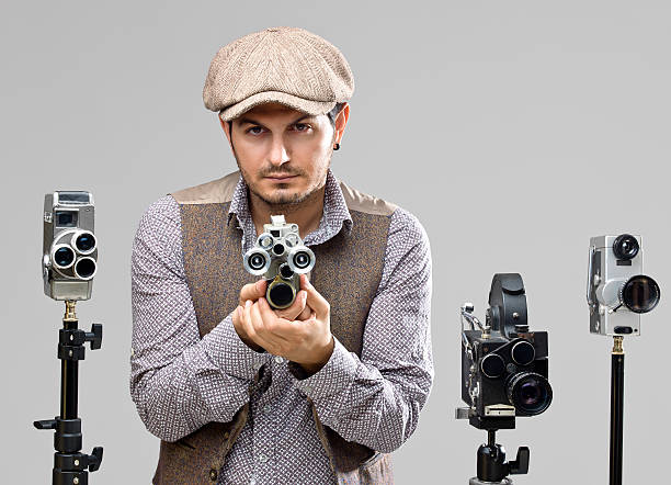 istock Film director behind camera 181079243