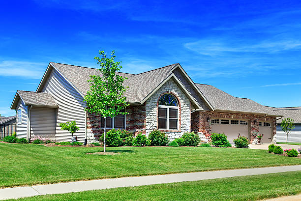 istock Brick and Vinyl Siding Home 181079287