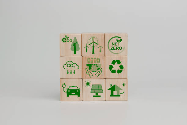 istock Net zero and carbon neutral concept. Net zero greenhouse gas emissions target. Climate neutral long term strategy. Wooden cubes with green net zero icon and green icon on white background. 1810794678