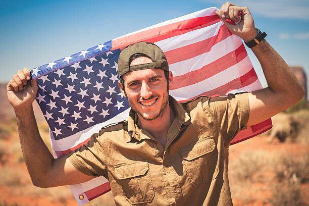 istock Tourist with us flag 181080239