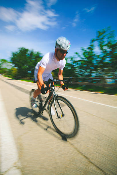 istock Cyclist in a Country Road 181080340