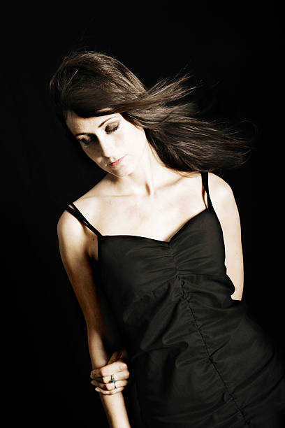 istock Woman portrait on black 181080584