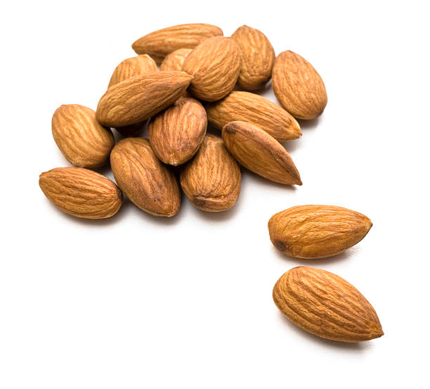 istock Handful of almonds on a white background 181081691