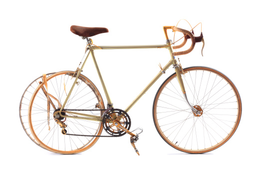 old racing bicycle with flat tire; including clipping path /// more related pics here: