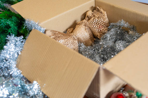 istock Packing away fragile Christmas decorations 1810831679