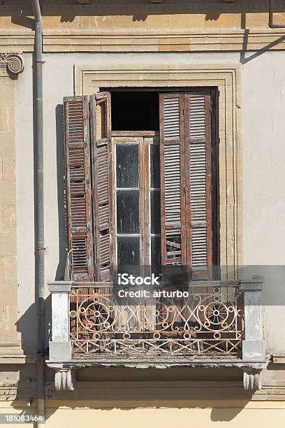 Worn Wooden Grunge Weathered Window Shutter And Balcony Nicosia Cyprus Stock Photo - Download Image Now