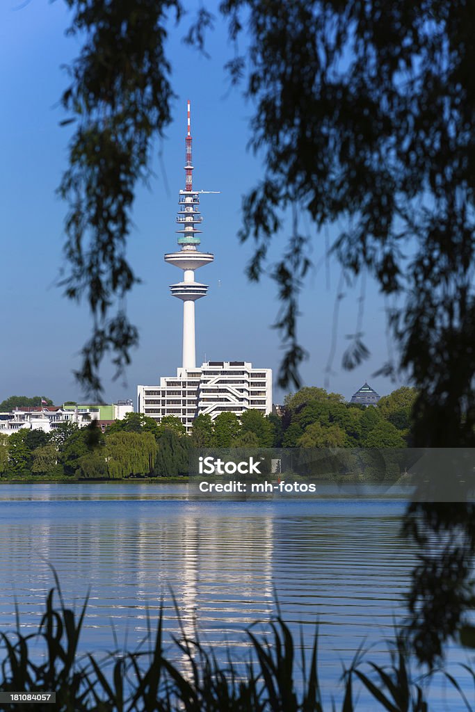 Television tower in Hamburg I LOVE HAMBURG: TV Tower behind the alster lake in Hamburg  - Germany - Taken with Canon 5Dmk3 / EF70-200 f/2.8L IS II USM Alster Lake Stock Photo