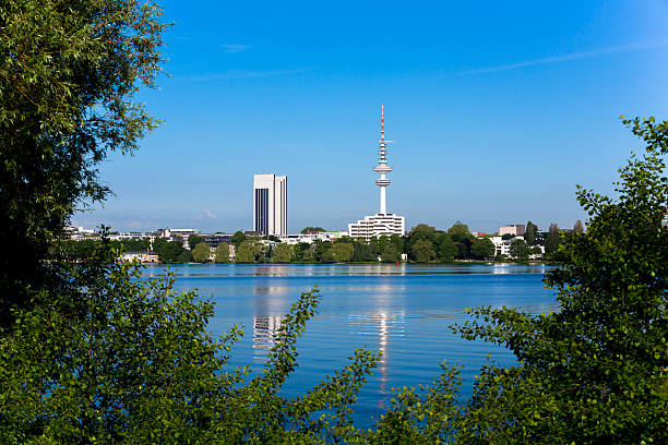 View to the alster lake I LOVE HAMBURG: TV Tower behind the alster lake in Hamburg  - Germany - Taken with Canon 5Dmk3 / EF70-200 f/2.8L IS II USM sendemast stock pictures, royalty-free photos & images