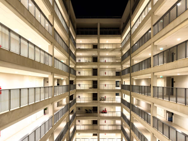 istock High rise apartment building at night time 1810844790