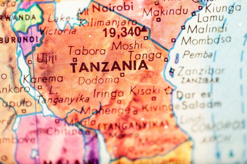 Studying Geography - Tanzania on retro globe.