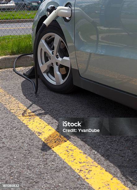 Electric Car Charging Stock Photo - Download Image Now - Asphalt, Cable, Clean