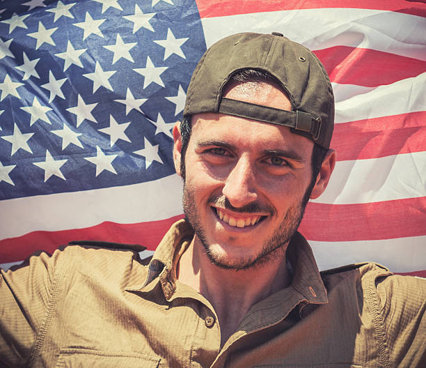 istock Tourist with us flag 181086230
