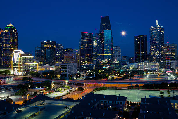 istock Skyline of Dallas at night with bright lights 181087750