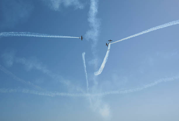 istock Aerobatic stunt show on the sky by three airplanes 181088383
