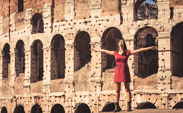 istock freedom tourist under coliseum 181088459