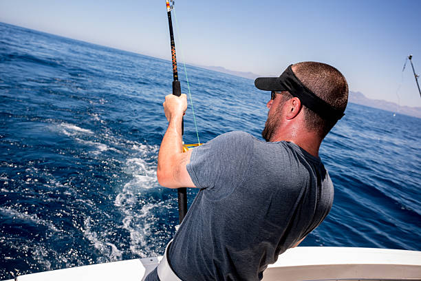 istock Young Man Fishing 181088758