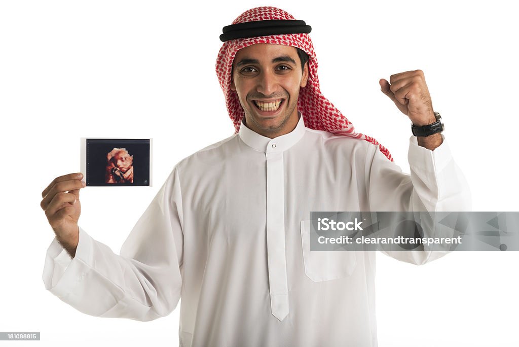 Happy Arabische Mann hält baby-Bild - Lizenzfrei Saudi-Arabien Stock-Foto