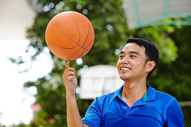istock Young man with basketball 181089081
