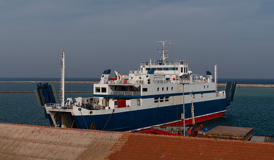 A ship anchored in the port of Famagusta. Famagusta (Gazimagusa in Turkish), North Cyprus.