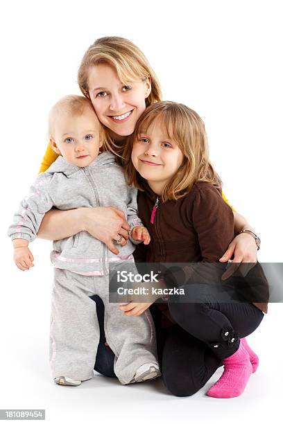 Mother With Daughters Isolated On White Stock Photo - Download Image Now - 12-17 Months, Adult, Beautiful People