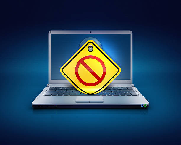 noentry or blocked no access sign on computers pc stock photo