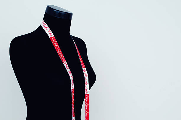 istock Measuring Tape Draped Over mannequin form 181089806