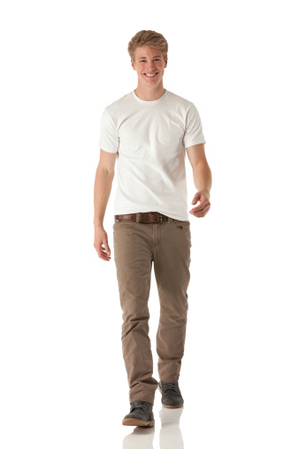 Attractive young smiling man walkinghttp://www.twodozendesign.info/i/1.png