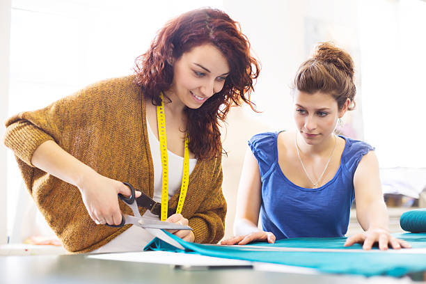 istock Fashion designers working together 181090481