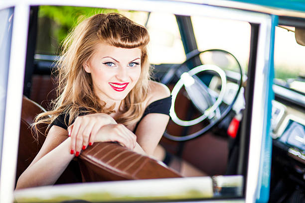 istock Pin-up girl with car 181091826