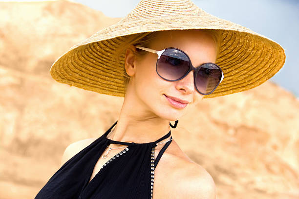 istock beautiful girl with hat in sunglass 181091885