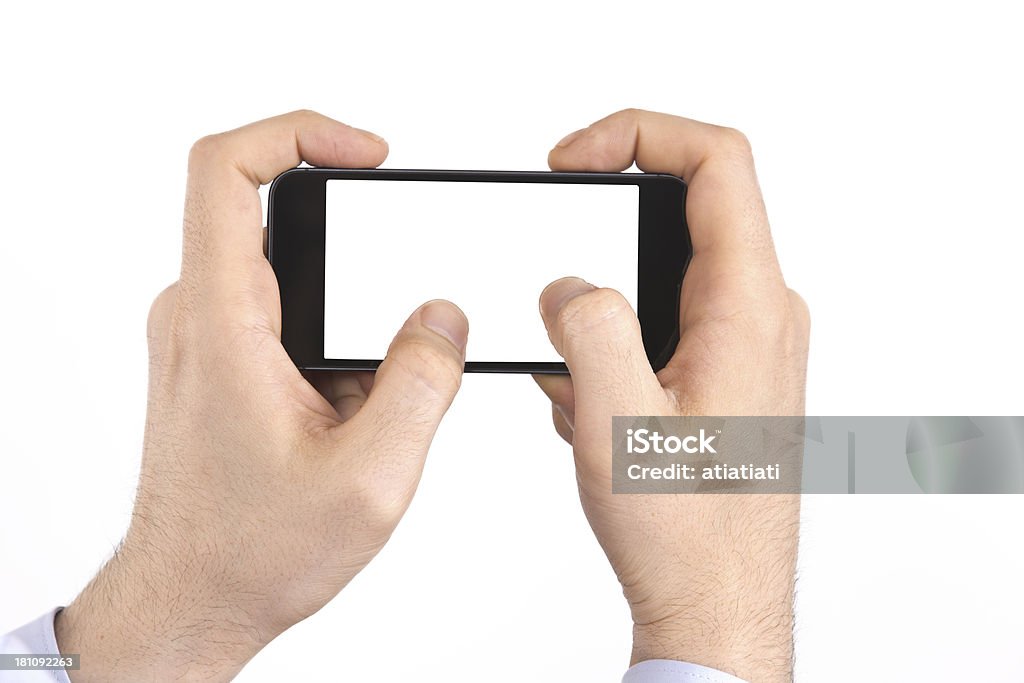 Mano de hombre usando un teléfono inteligente - Foto de stock de Adulto libre de derechos