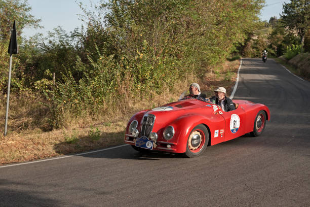 Racing car Lancia Aprilia Volpini Barchetta (1937) in classic car race Gran Premio Nuvolari, on September 17, 2023 in Predapppio, FC, Italy Racing car Lancia Aprilia Volpini Barchetta (1937) in classic car race Gran Premio Nuvolari, on September 17, 2023 in Predapppio, FC, Italy premio stock pictures, royalty-free photos & images