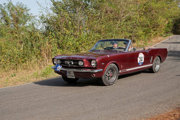 Vintage Ford Mustang Convertible (1965) in classic car race Gran Premio Nuvolari, on September 17, 2023 in Predapppio, FC, Italy Vintage Ford Mustang Convertible (1965) in classic car race Gran Premio Nuvolari, on September 17, 2023 in Predapppio, FC, Italy premio stock pictures, royalty-free photos & images