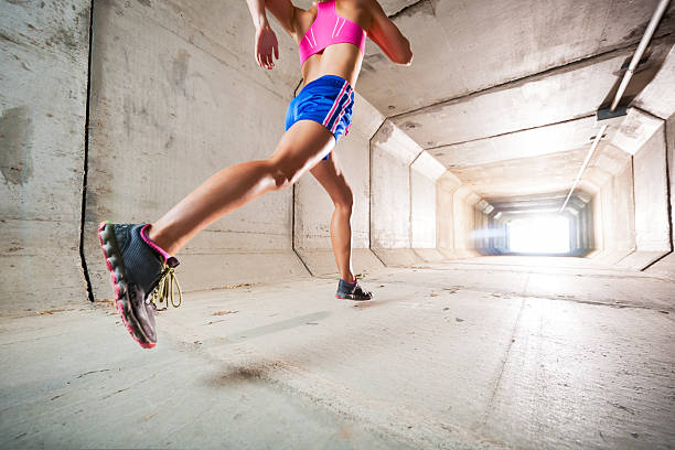 Athletic woman on track at the stadium.