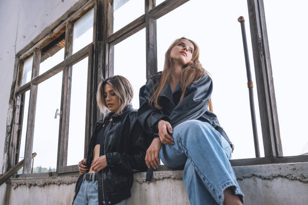 istock Blondies in Blue Jeans and Leather Jackets 1810940312