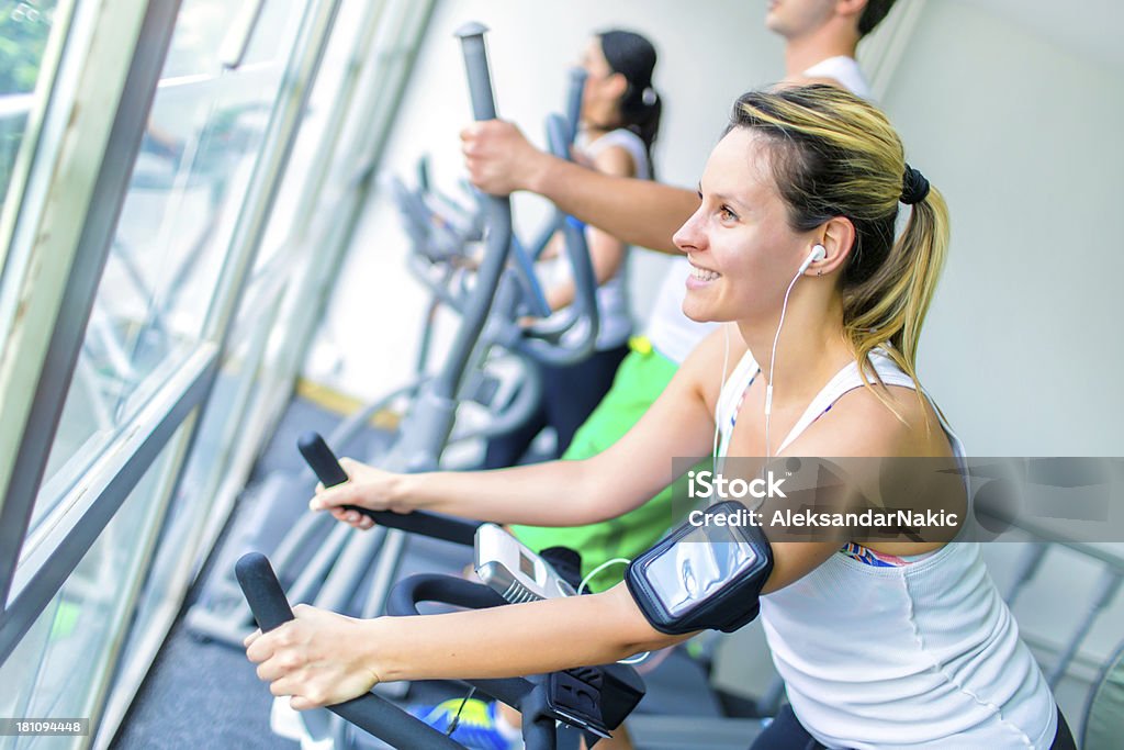 Cycling in a gym Active Lifestyle Stock Photo