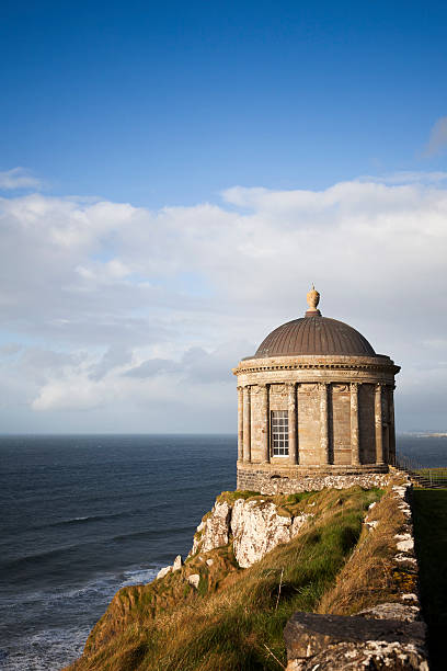Mussenden Temple On Cliff Near Downhill Northern Ireland View showing the Mussenden Temple which was built in 1785. Siting just outside of Castlerock and Downhill on the north west coast of Northern Ireland. Taken with Canon 5D Mark2. Castle Rock stock pictures, royalty-free photos & images