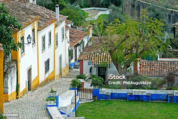 Cobblestone Path In Walled Portuguese Town Of Obidos Stock Photo - Download Image Now