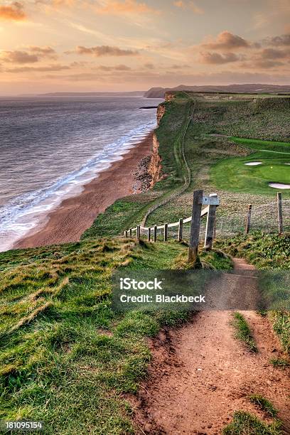 Footpath On The Dorset Jurassic Coast At Sunset Stock Photo - Download Image Now - Beach, Beauty In Nature, Cliff