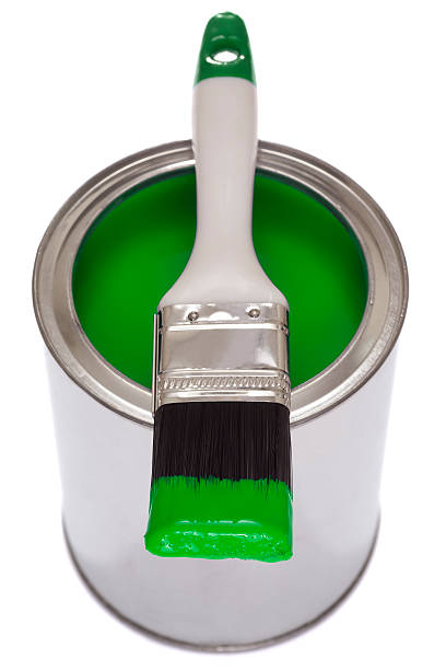 istock Paintbrush on a tin of green paint 181095265