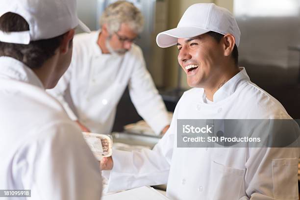 Volunteer Chefs Preparing Frozen Meals To Be Delivered For Charity Stock Photo - Download Image Now