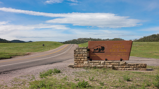 Custer, South Dakota, USA - Jun 24, 2023: The welcome sign at the entrance of Custer State Park