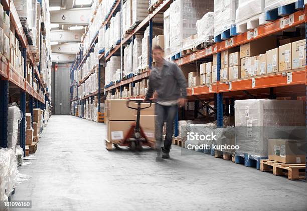 Rushing To Get The Order Ready Stock Photo - Download Image Now - Warehouse Worker, Blurred Motion, Motion