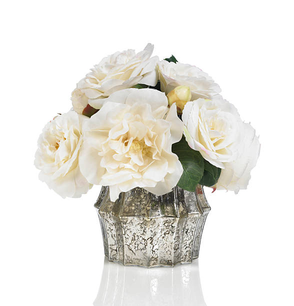 istock Cream colored camellia and rose bouquet on white background 181096412