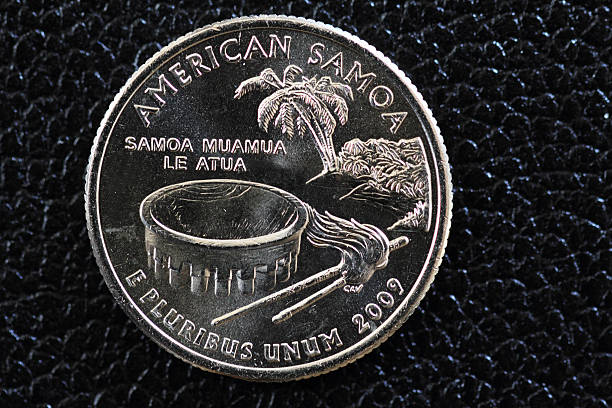 American Samoa U.S. Commemorative Quarter 2009 Close up of an American Samoa U.S. Commemorative Quarter 2009. 2009 stock pictures, royalty-free photos & images