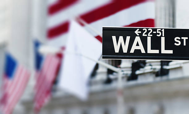 istock wall street sign on us flag 181097281
