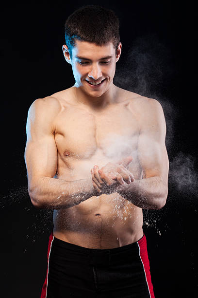 istock Young muscular male with powder 181097451