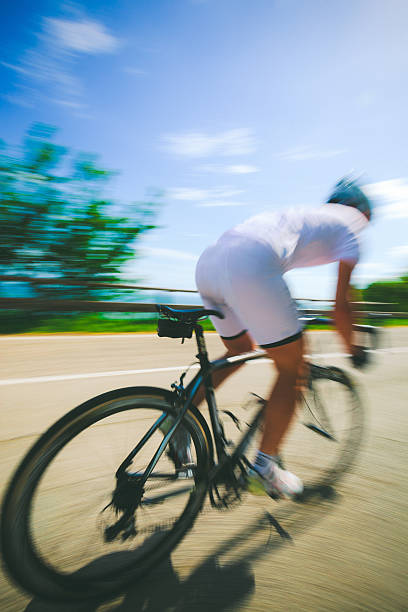 istock Cyclist in a Country Road 181097490