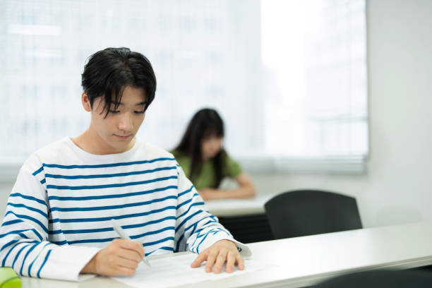 istock Asian teenagers studying in a tuition class 1810975622